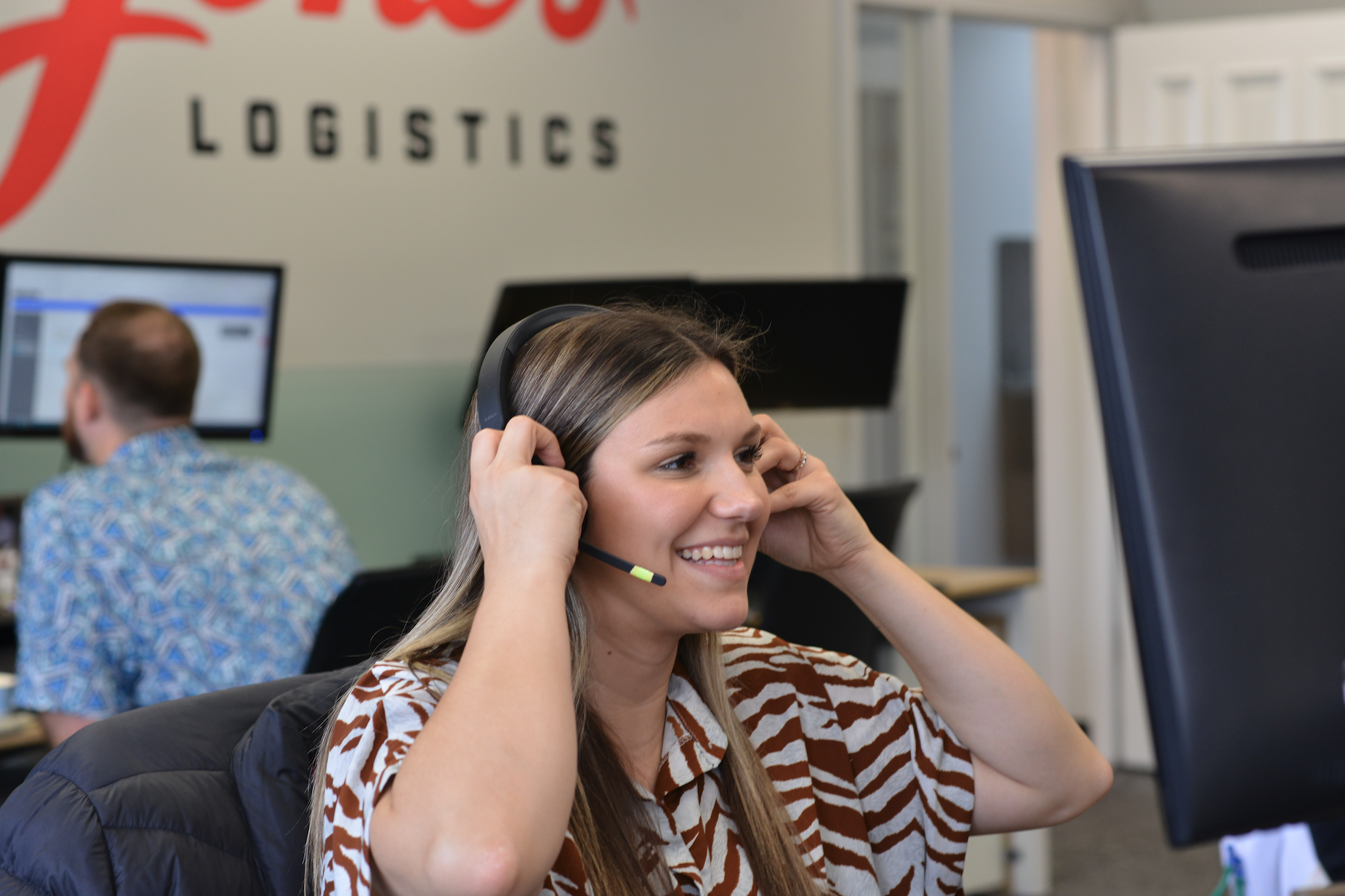 Alese James, and inside sales representative at Jones Logistics, is talking on the phone with a 3PL customer.