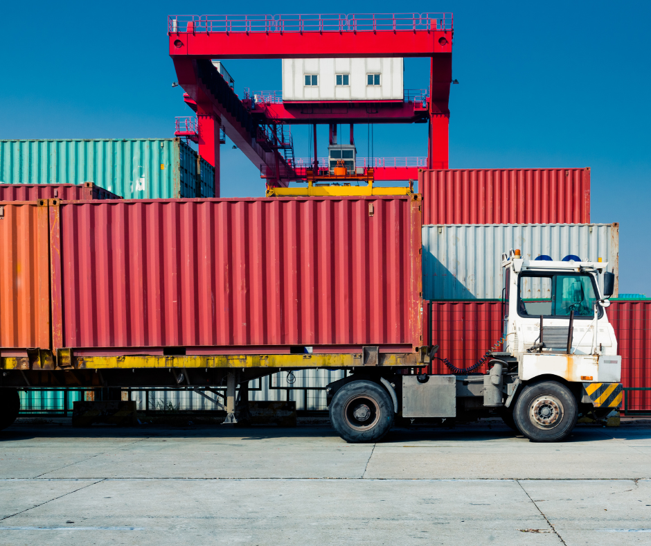 Drayage container is loaded onto a truck at the port.